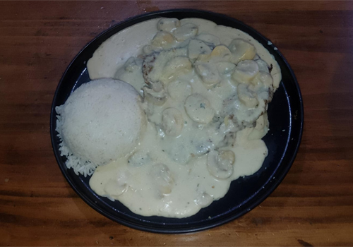 Lomo fino en salsa de champiñones